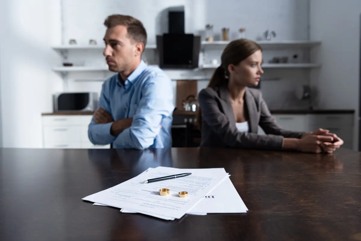 Couple meeting with a divorce attorney