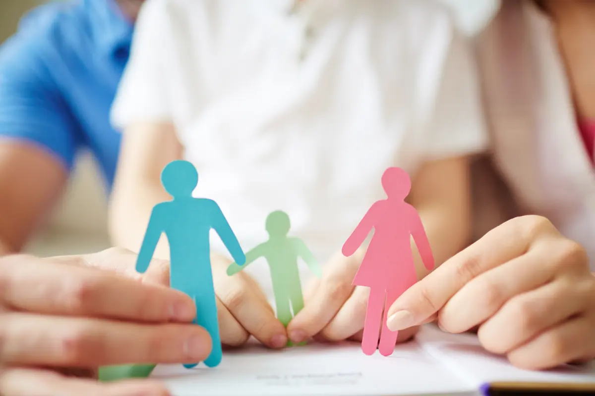 Parent and child walking together, representing child support